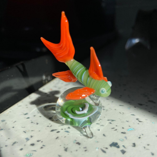 Green Stripy Fish with Red Fins